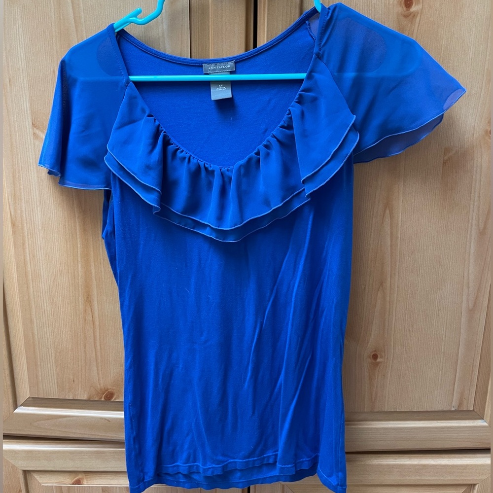 BEAUTIFUL blue top. Sheer sleeves and sheer ruffle front.